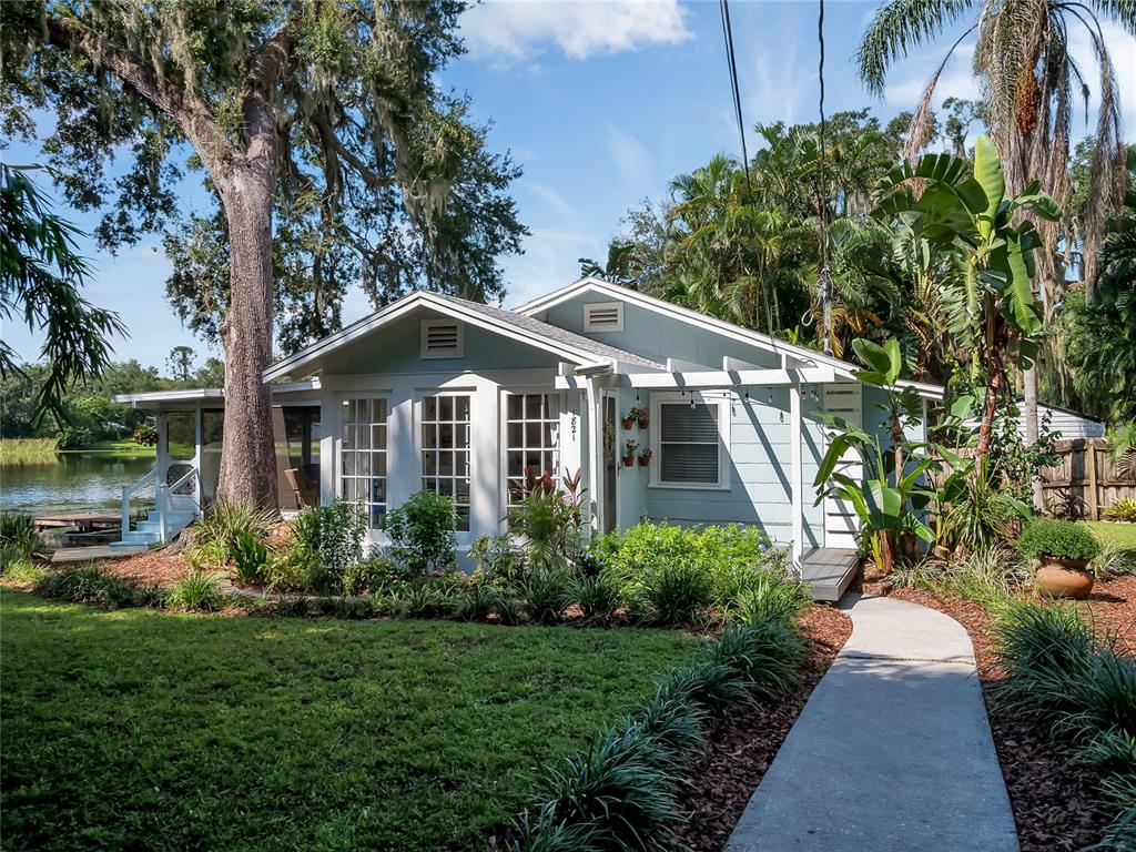 a front view of a house with garden