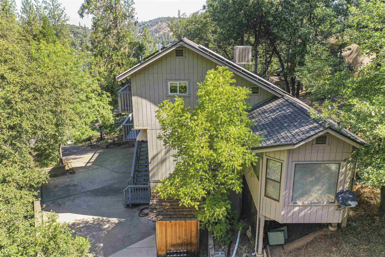 View of side of home featuring a patio