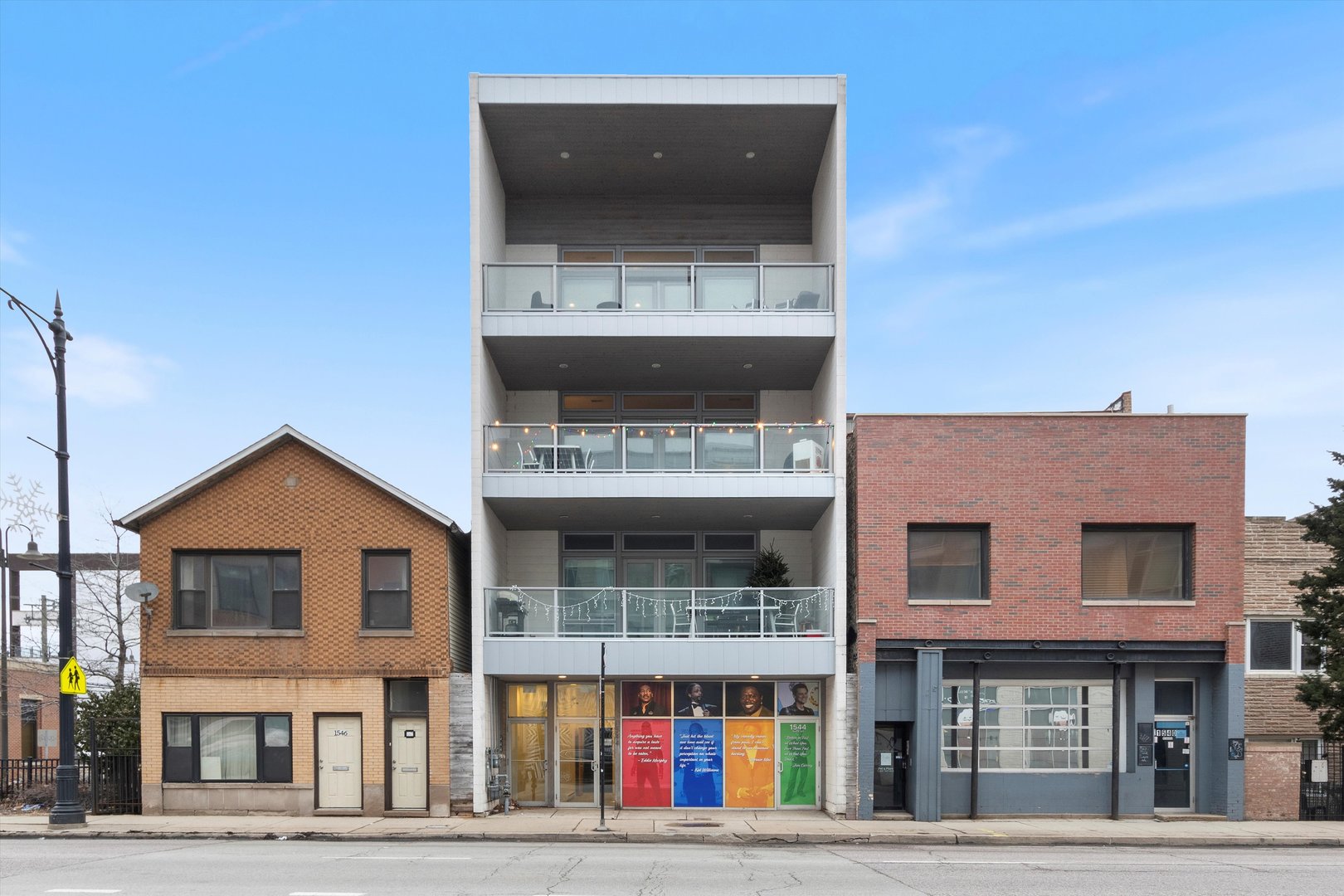 a front view of multi story residential apartment building