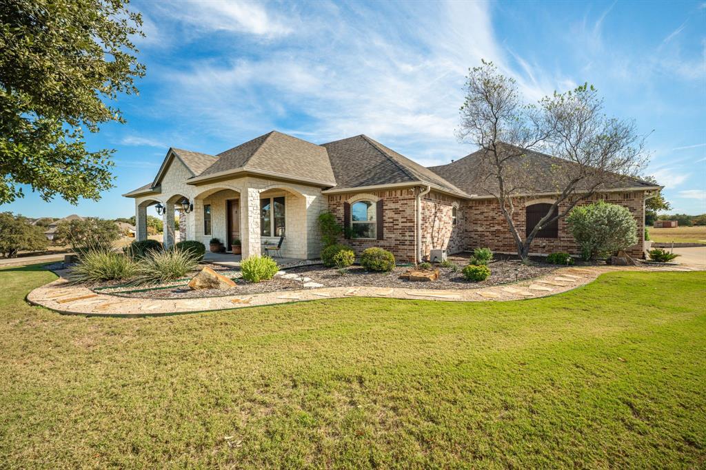 a front view of a house with swimming pool