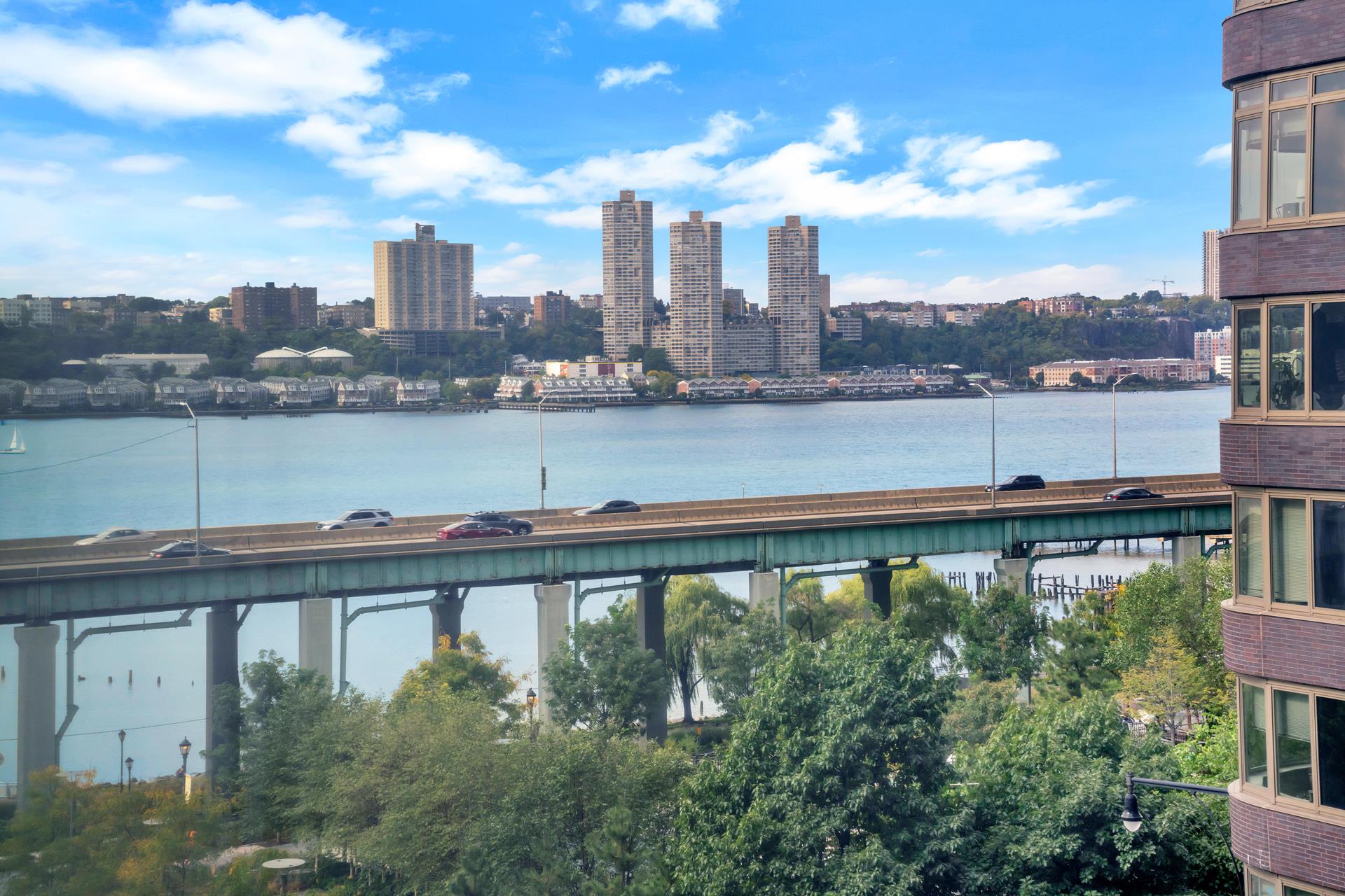 a view of a city skyline from a lake