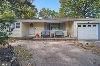 front view of house with a yard