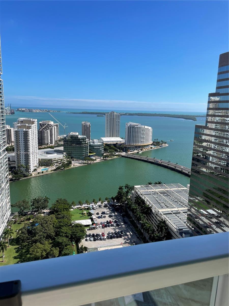 a view of a lake with a city