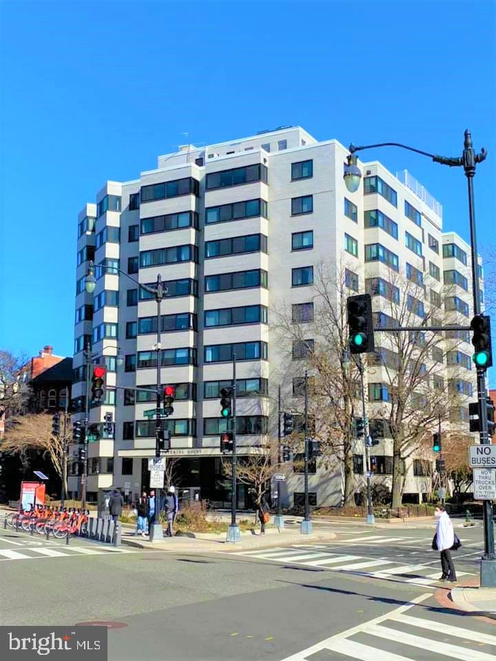 a front view of a building with street view