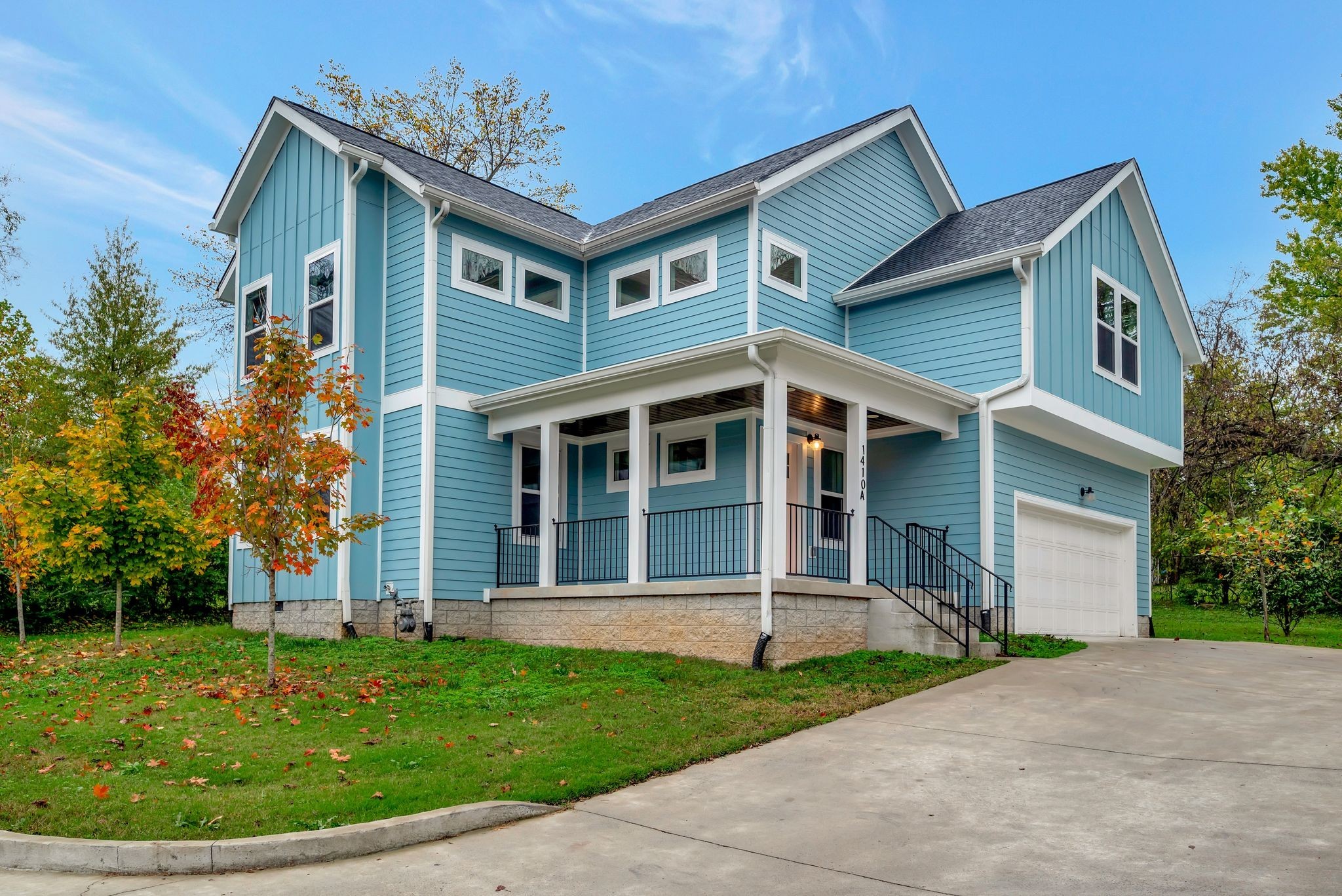 front view of a house with a yard