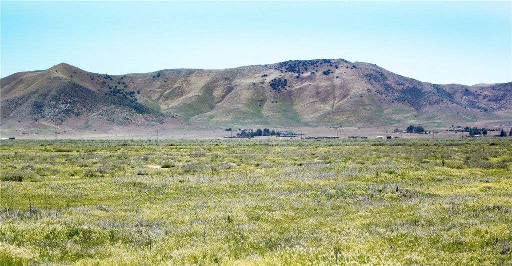 a view of outdoor space and mountain view