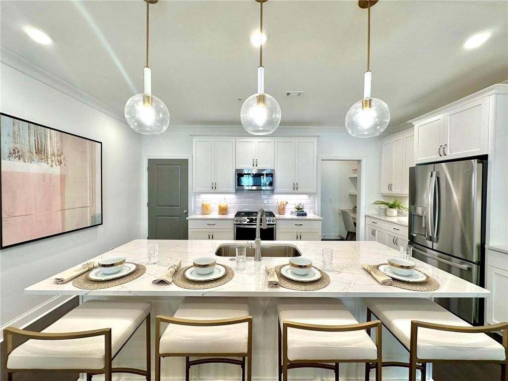 a view of a dining room and a table