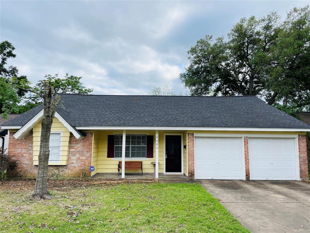 front view of house with a yard