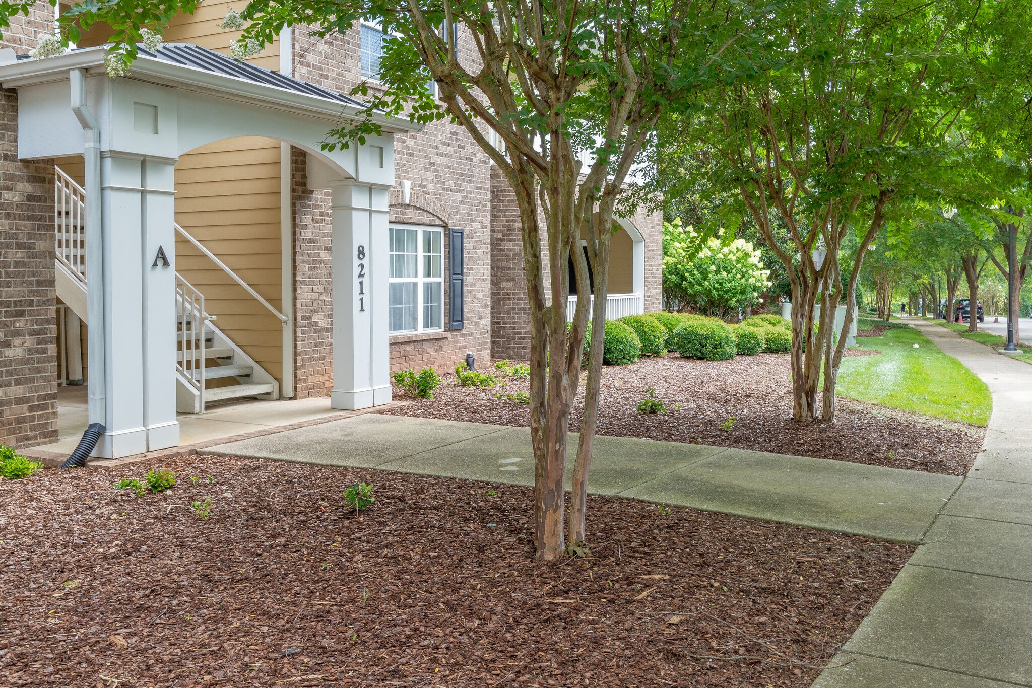 Welcome to Lenox Creekside! Beautiful mature trees and landscape that is taking care of by the HOA.