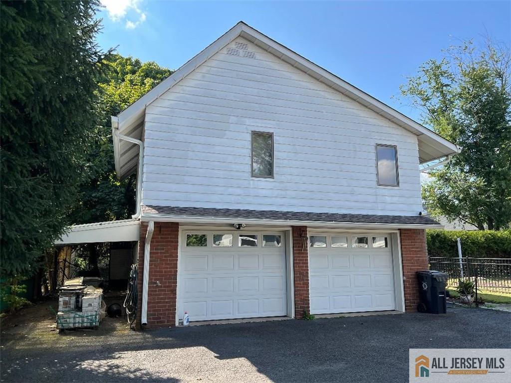 a front view of a house with a garage