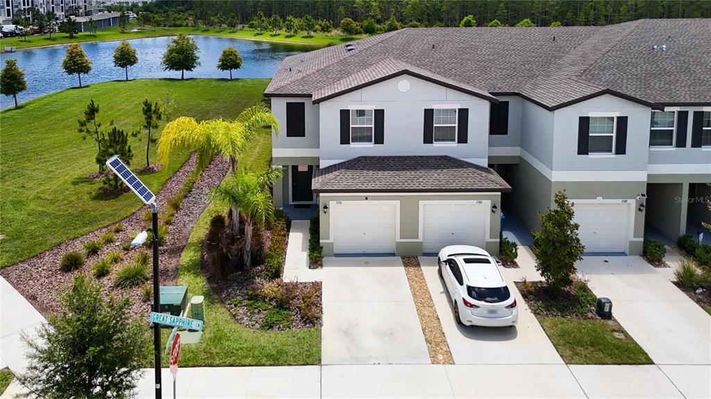 a front view of house with outdoor space and seating area