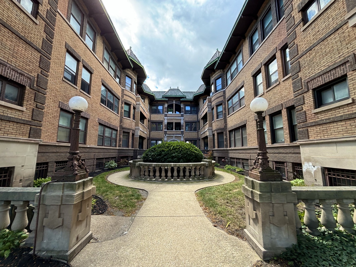 a view of a building with a garden