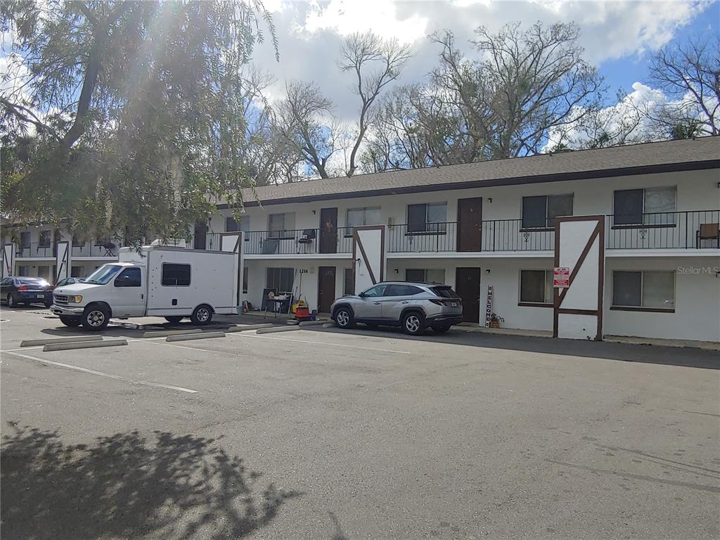 a view of a cars park in front of house