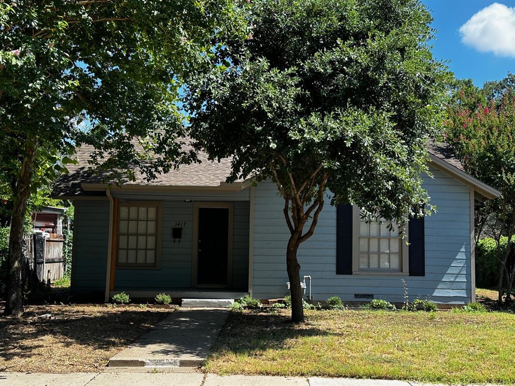 a front view of house with yard