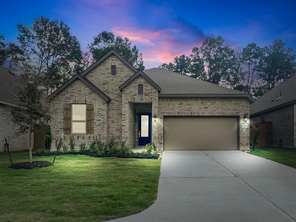 Charming single-story residence showcasing elegant brickwork and an inviting entrance.