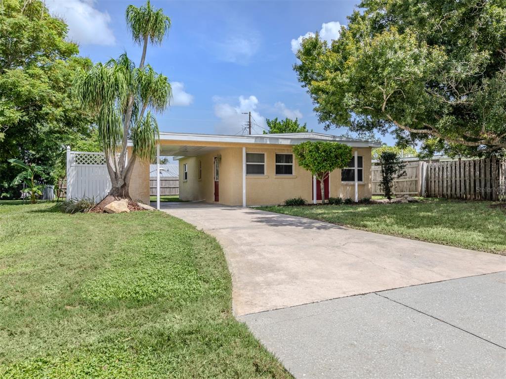 front view of a house with a yard