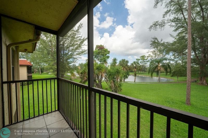 a view of a porch with a yard