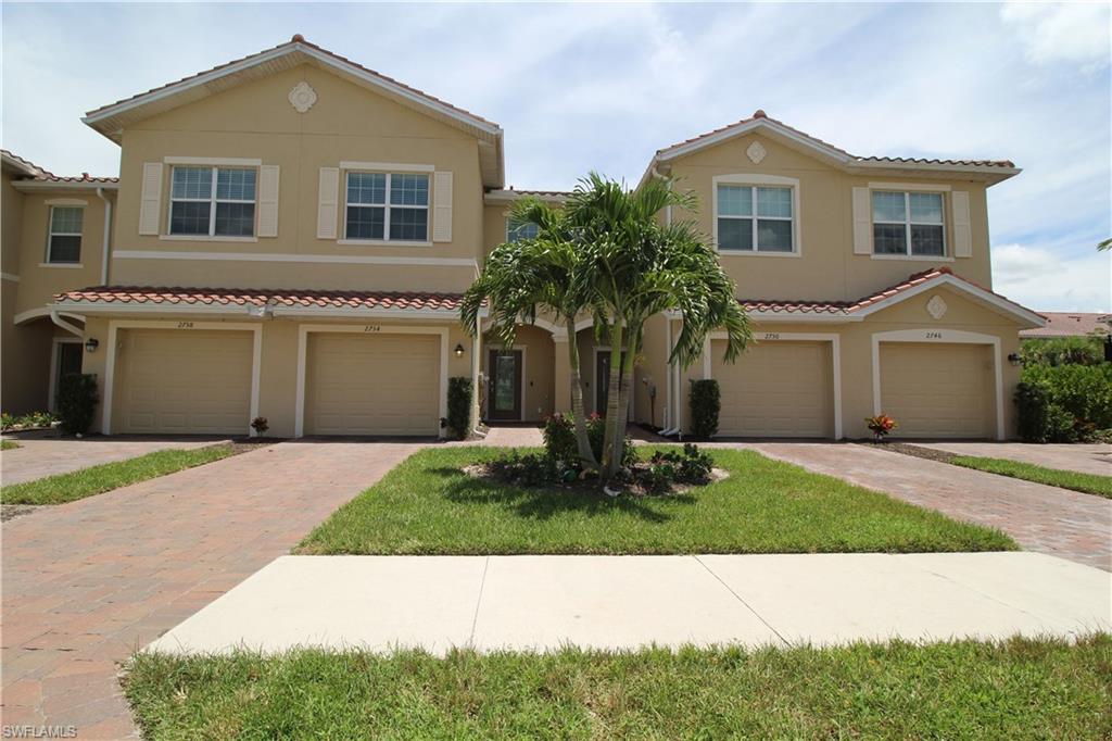 Mediterranean / spanish-style home featuring a garage