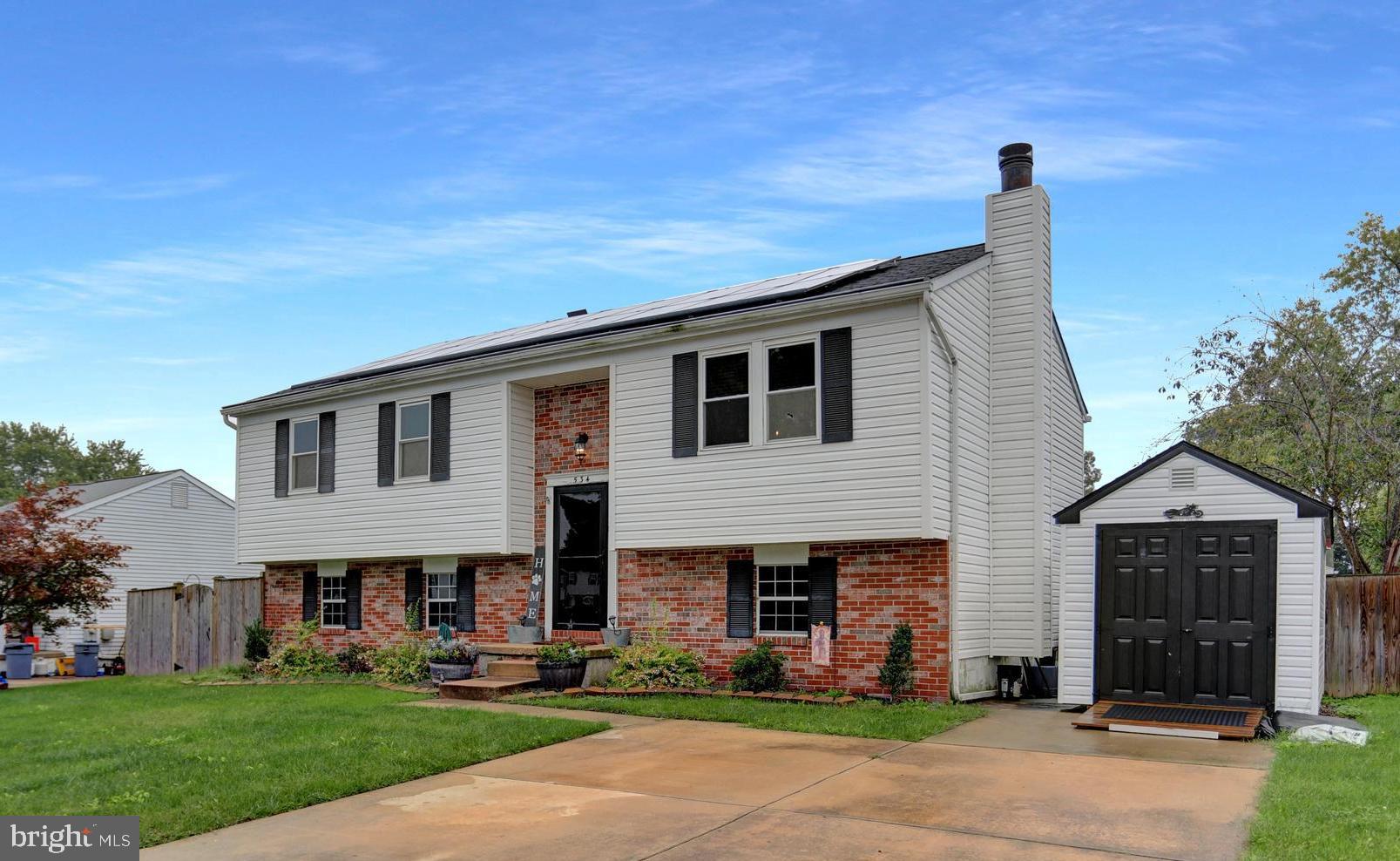 a front view of house with yard