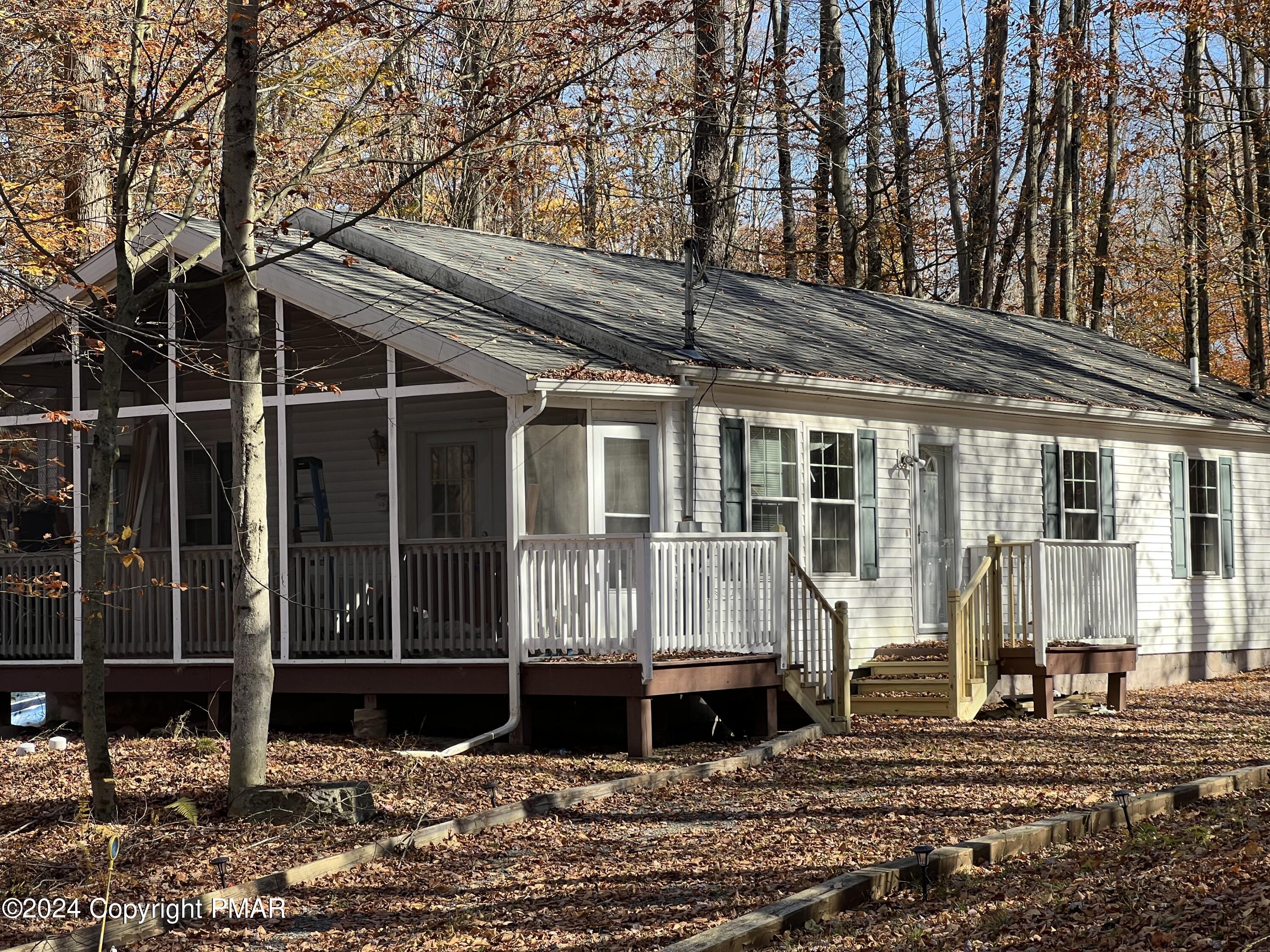 a front view of a house with a porch