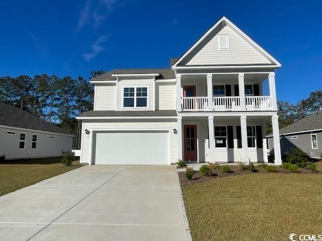 View of front of house featuring a garage, a front