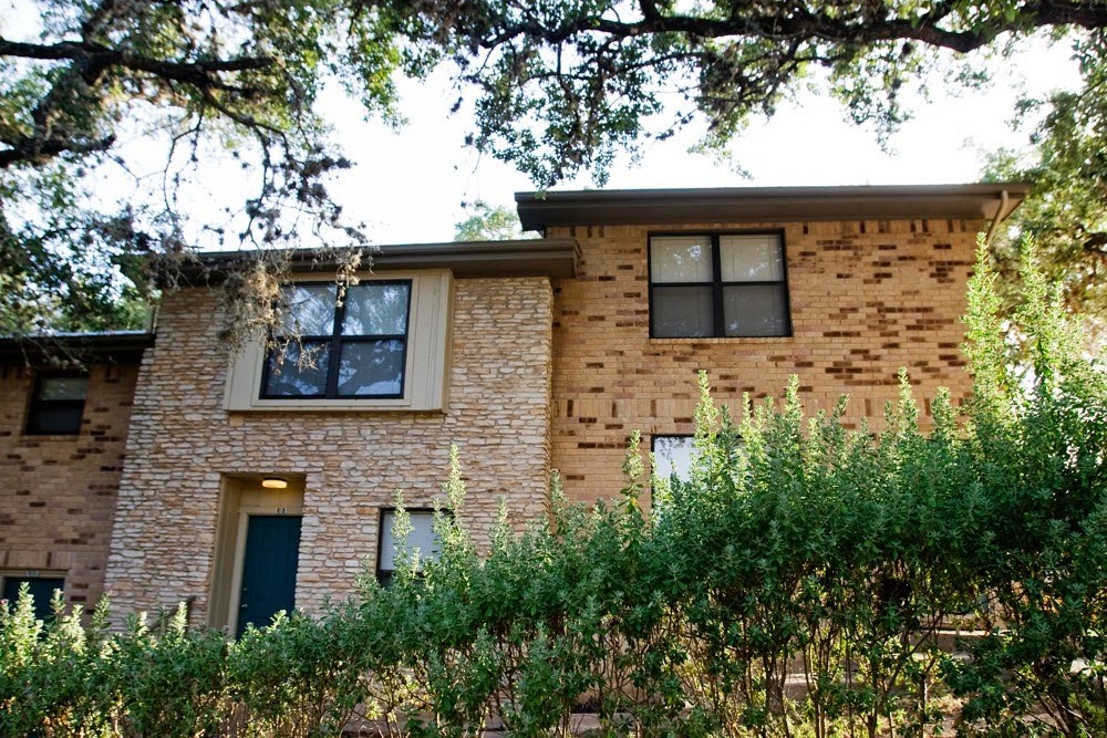 an outdoor view of house with yard