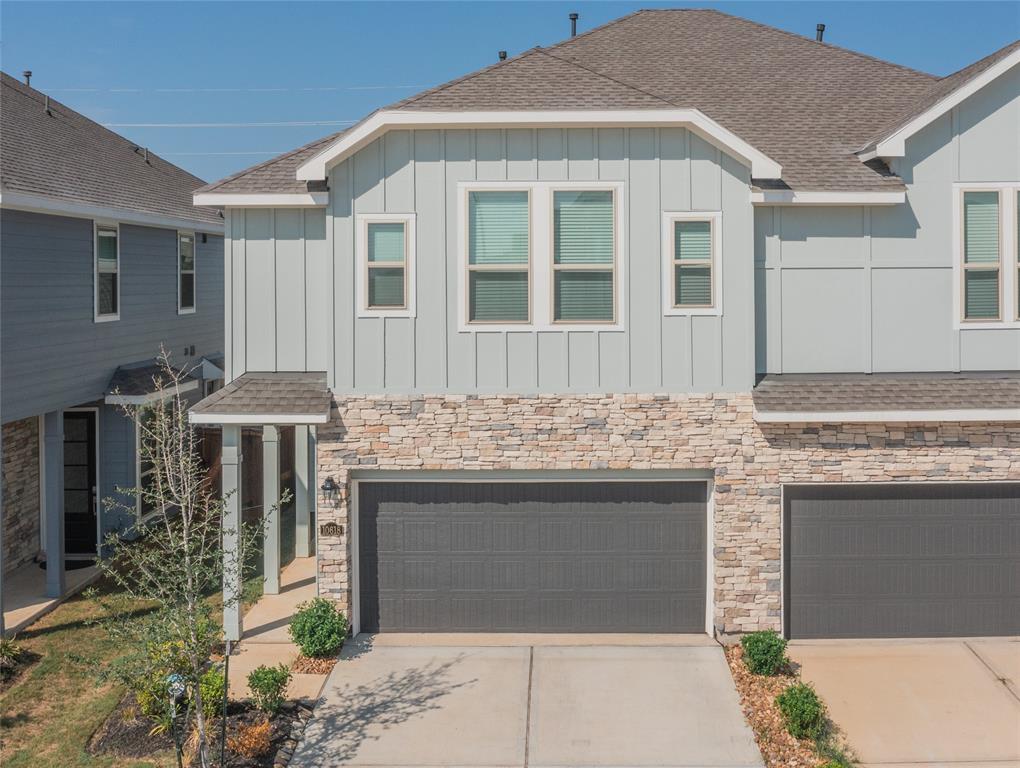 a front view of a house with yard