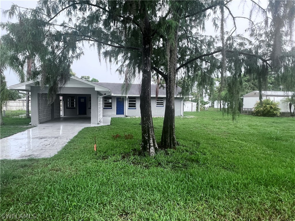 front view of a house with a yard