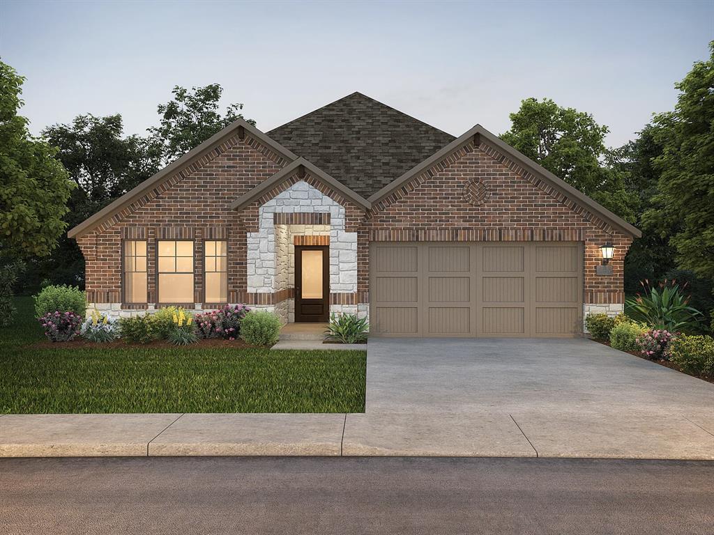 a front view of a house with a garden and garage