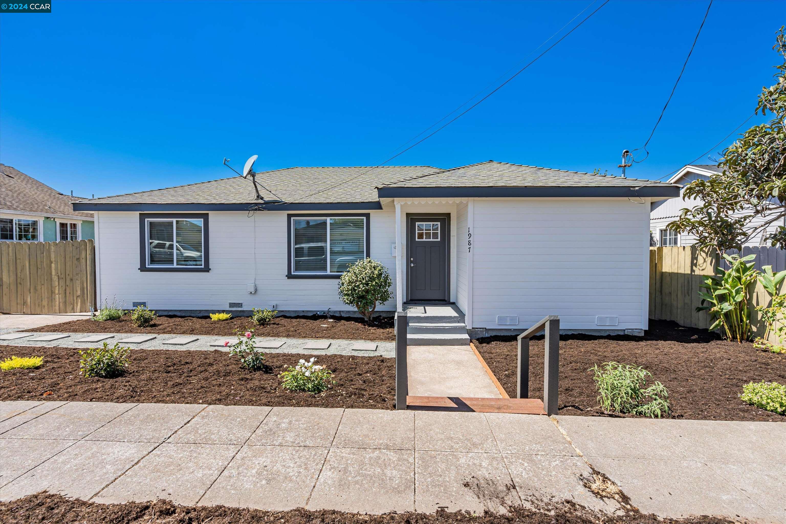 a front view of house with yard