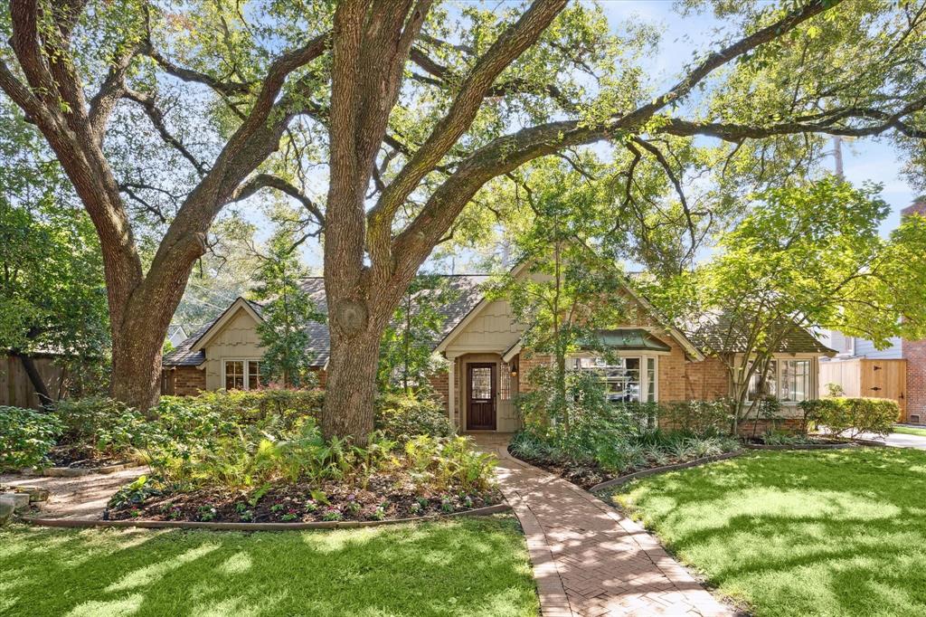 front view of a house with a garden