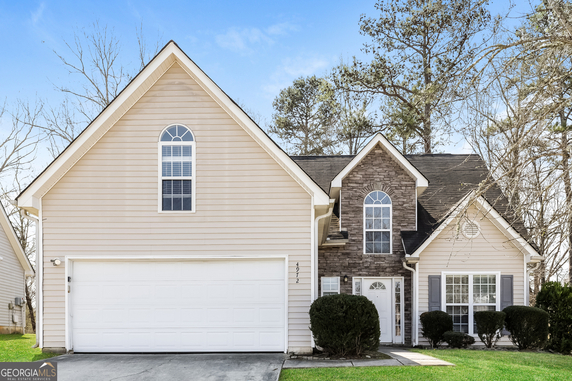 a view of outdoor space yard and front view of a house