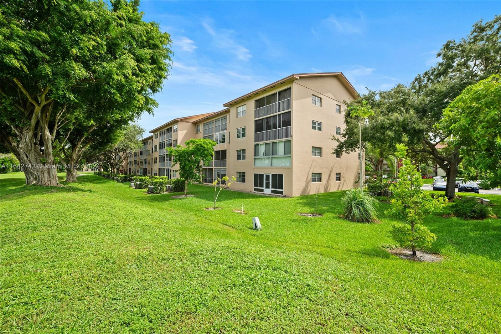 a view of an apartment with a garden and plants