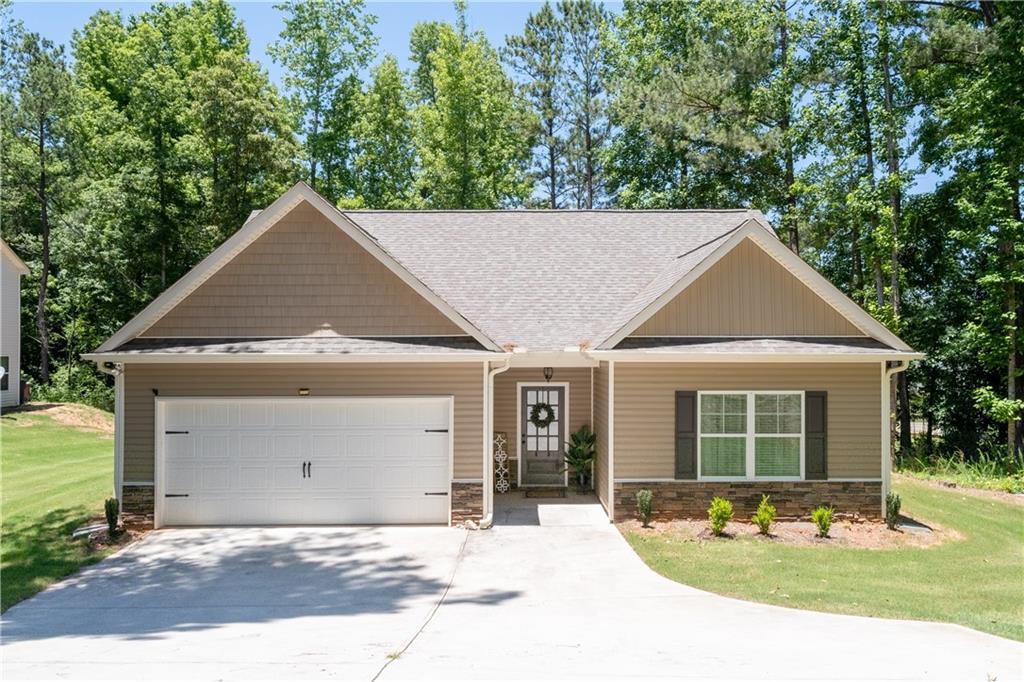 front view of a house with a yard