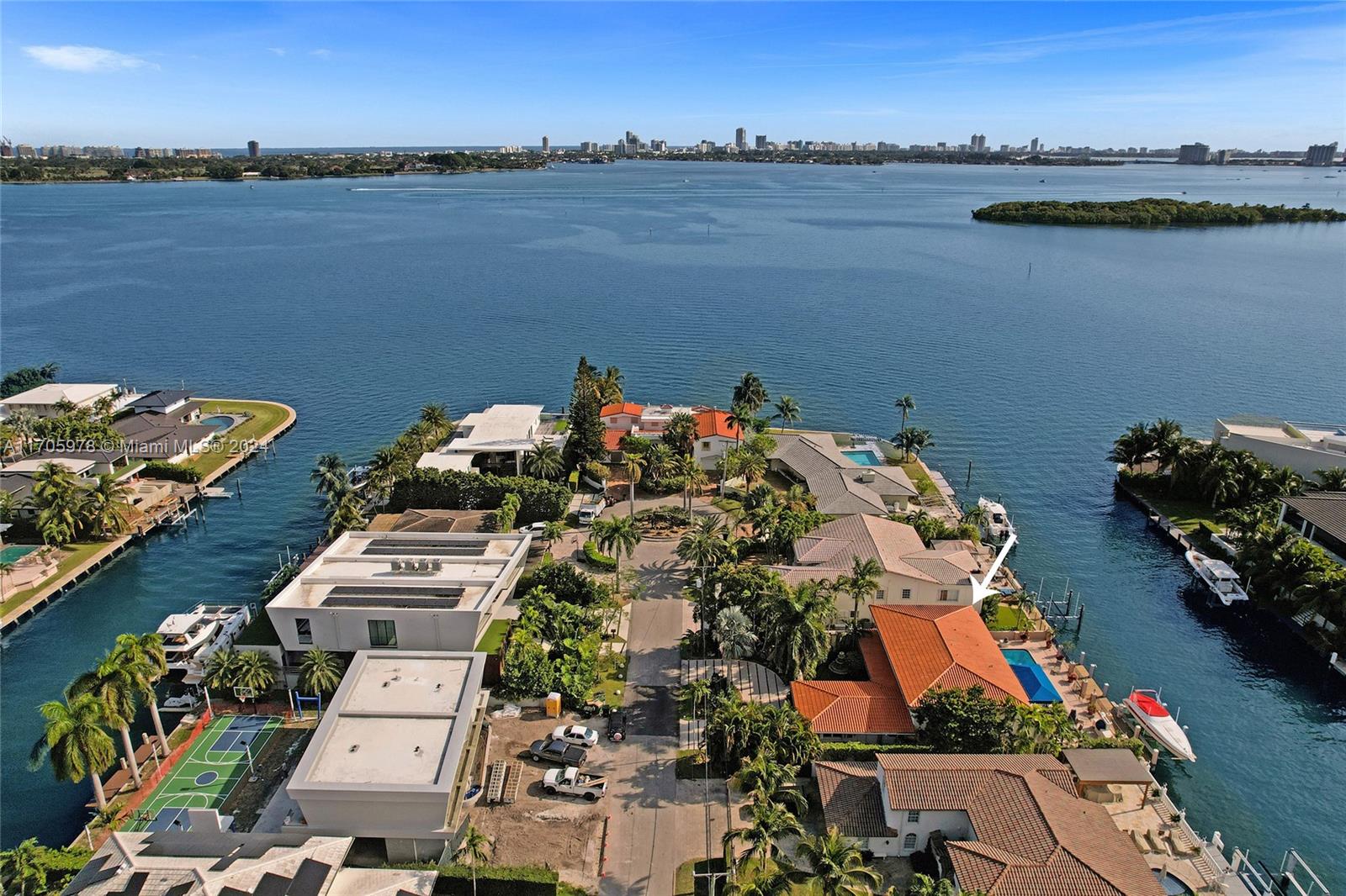 an aerial view of a house with a lake view