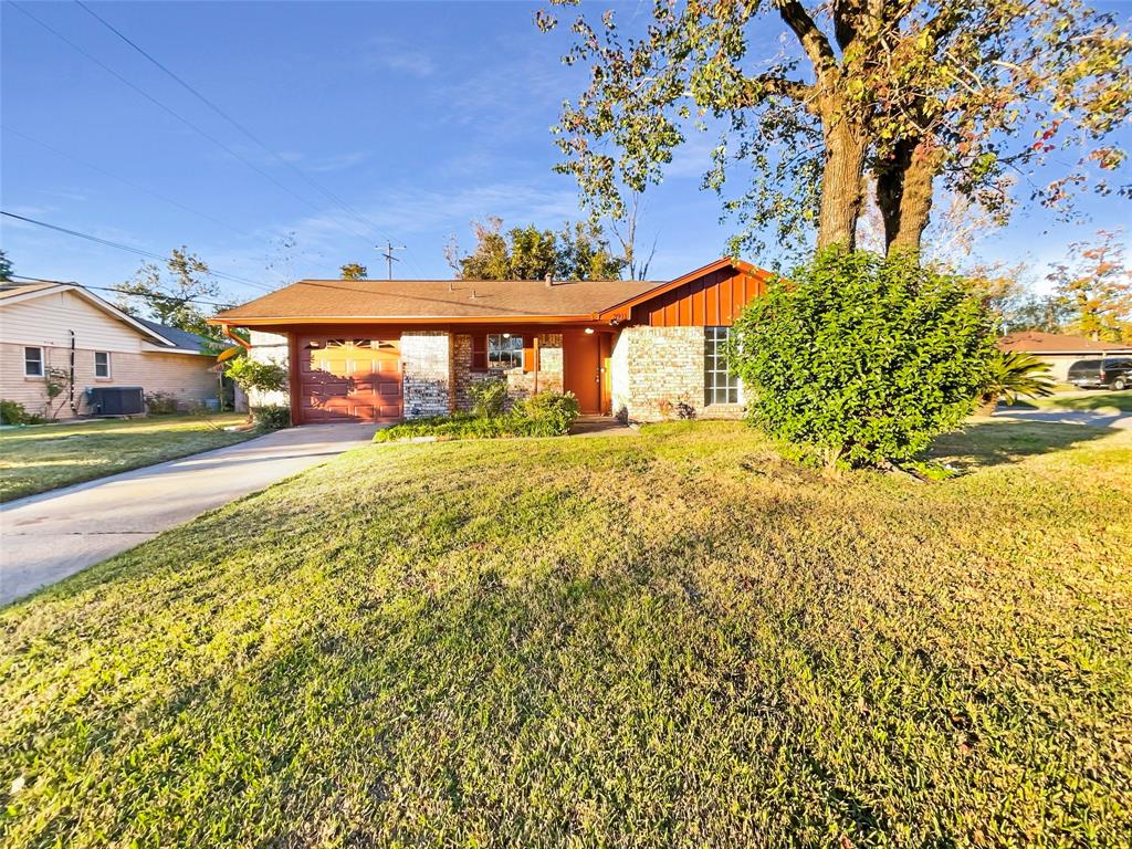 front view of a house with a big yard