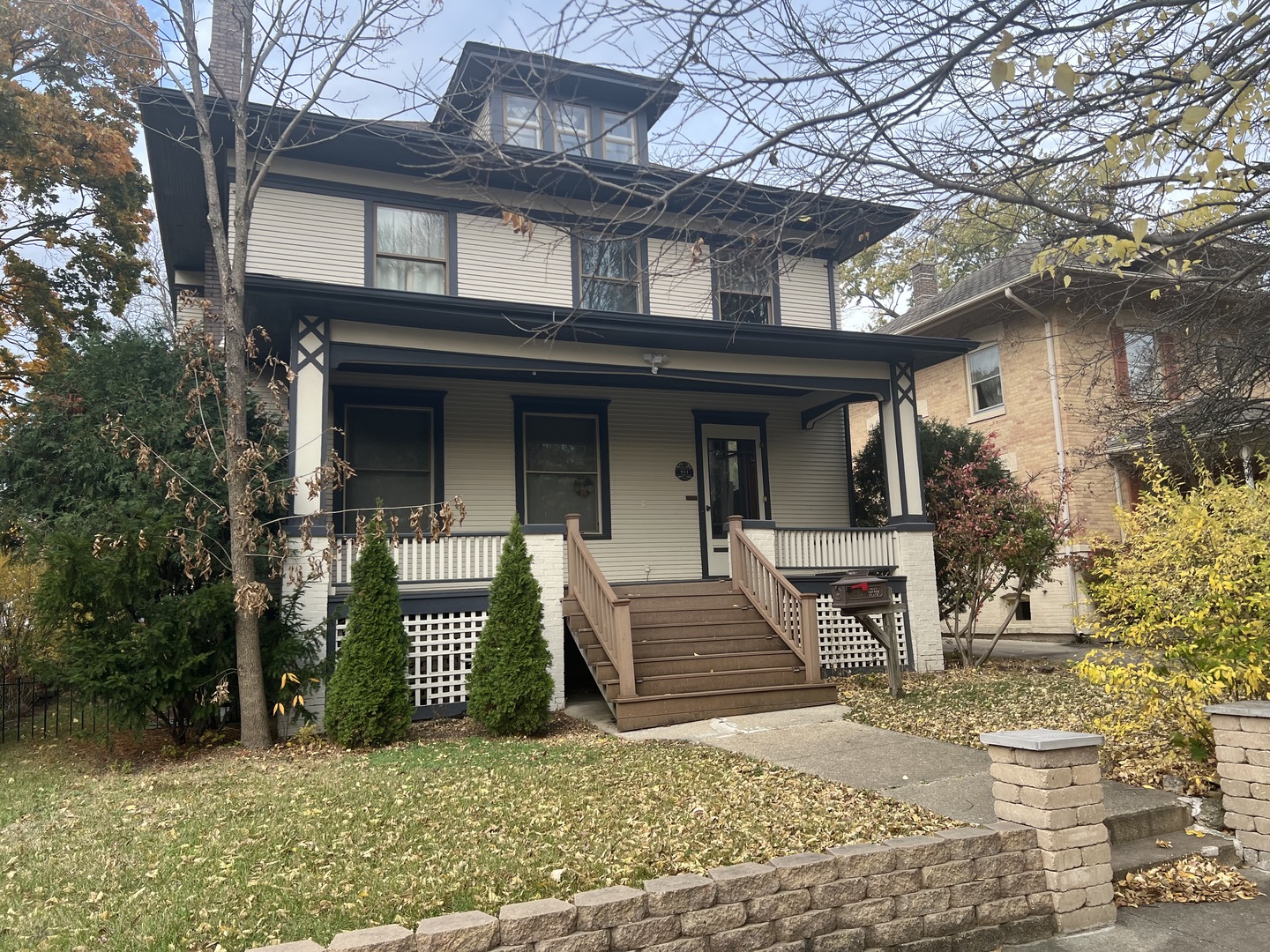 front view of a house with a yard