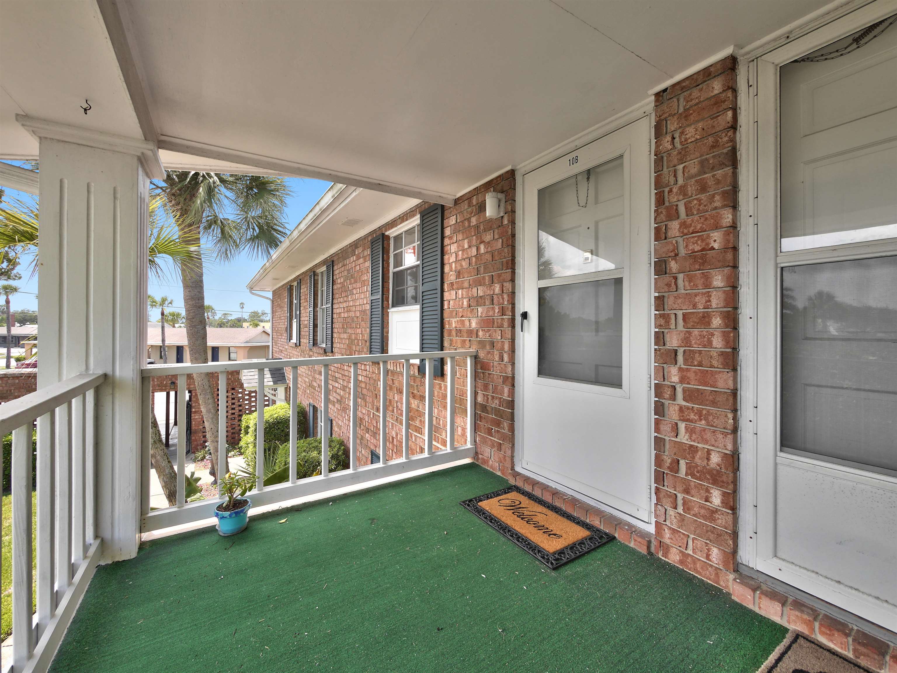 a view of an entryway with garden