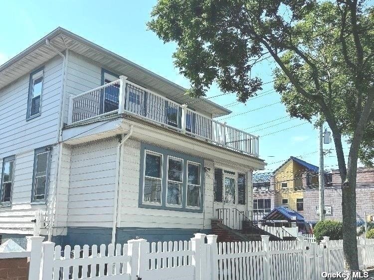 a front view of a house with a porch