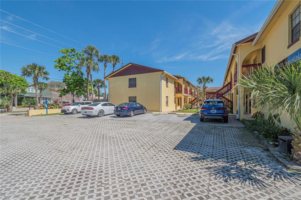 a view of a street with cars