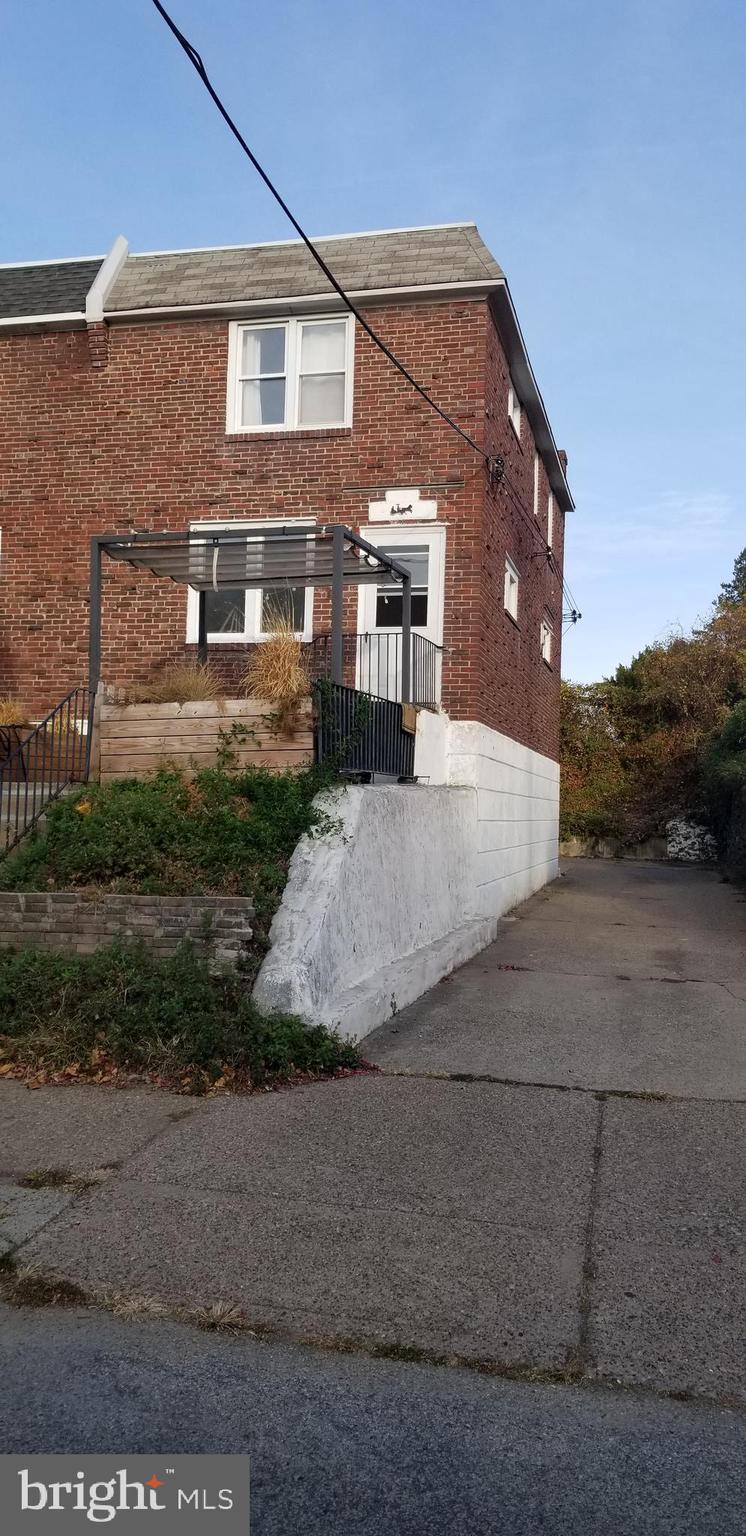 a front view of a house with yard