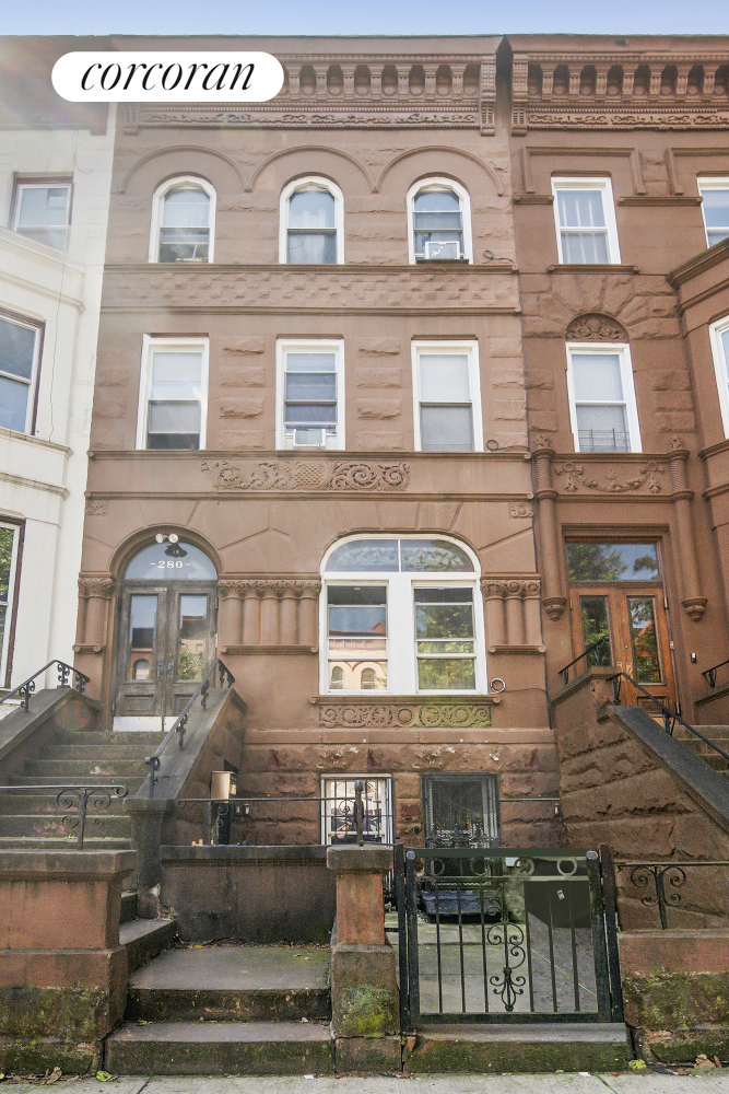 a front view of a building with glass windows