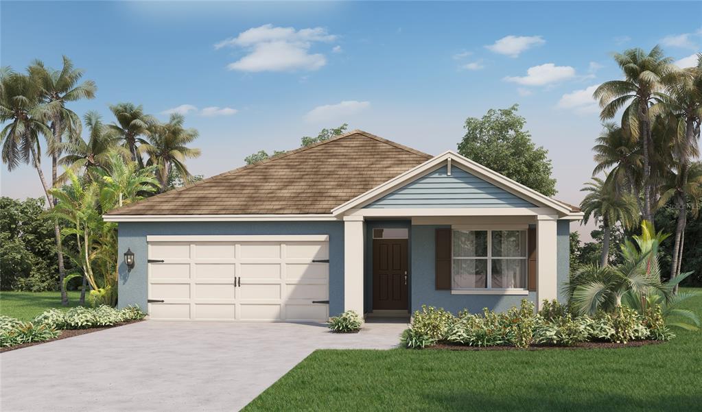 front view of house with a yard and a trees