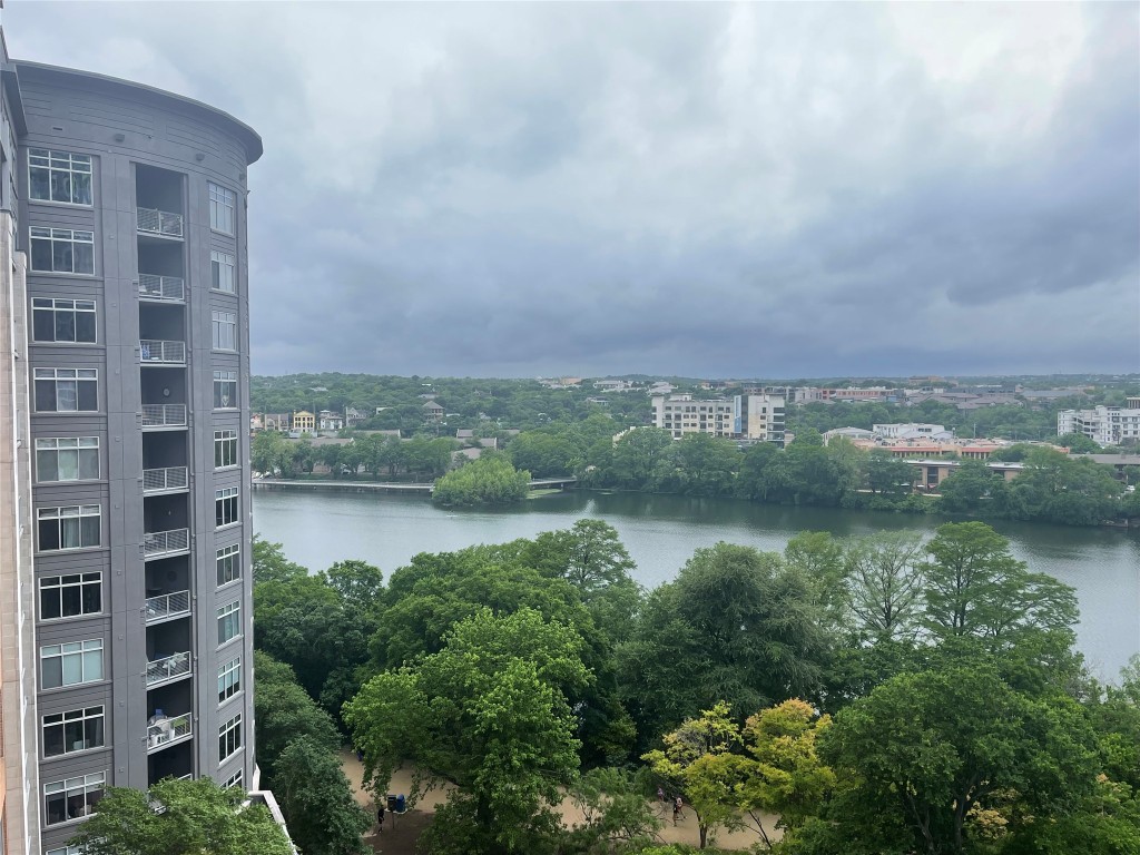 a view of lake with green field