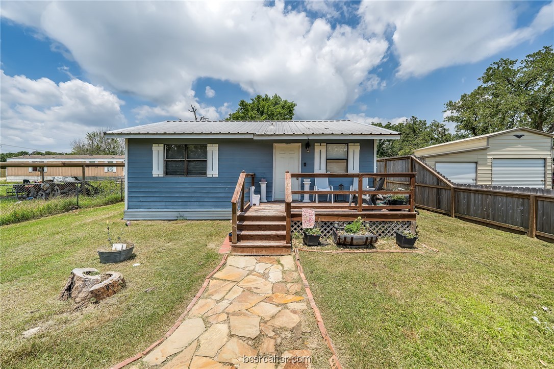 a front view of house with yard