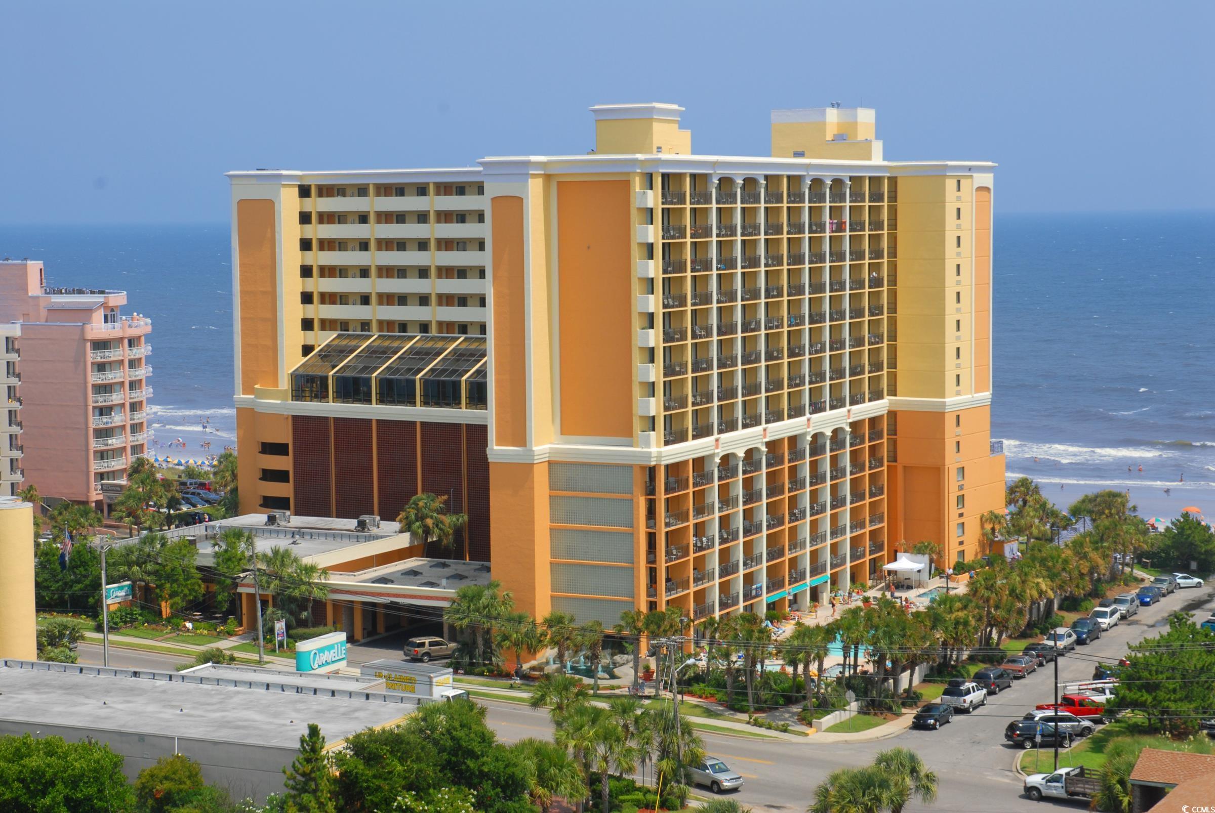 View of building exterior featuring a water view