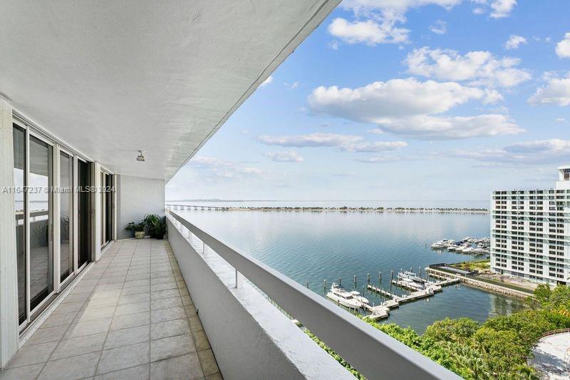 a view of balcony with furniture