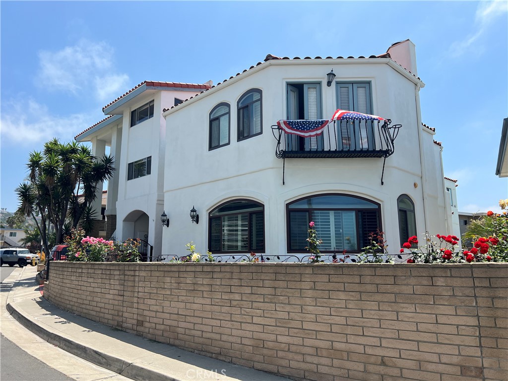 a front view of house with outdoor space