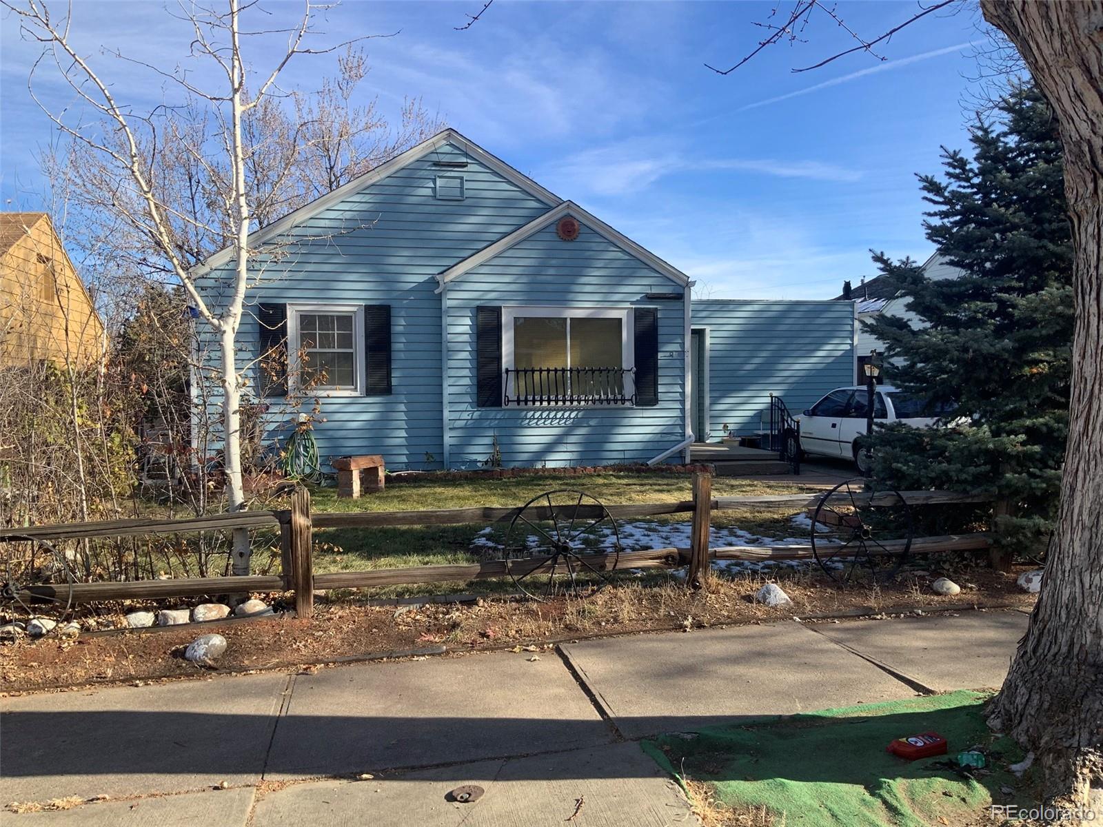 a front view of a house with garage