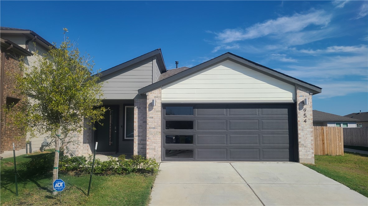 View of front of home with a garage